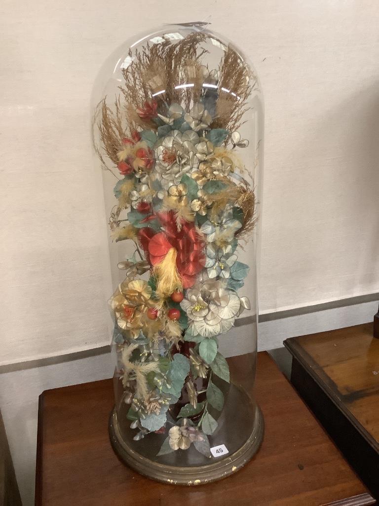 A Victorian fabric floral display under glass dome, height 78cm